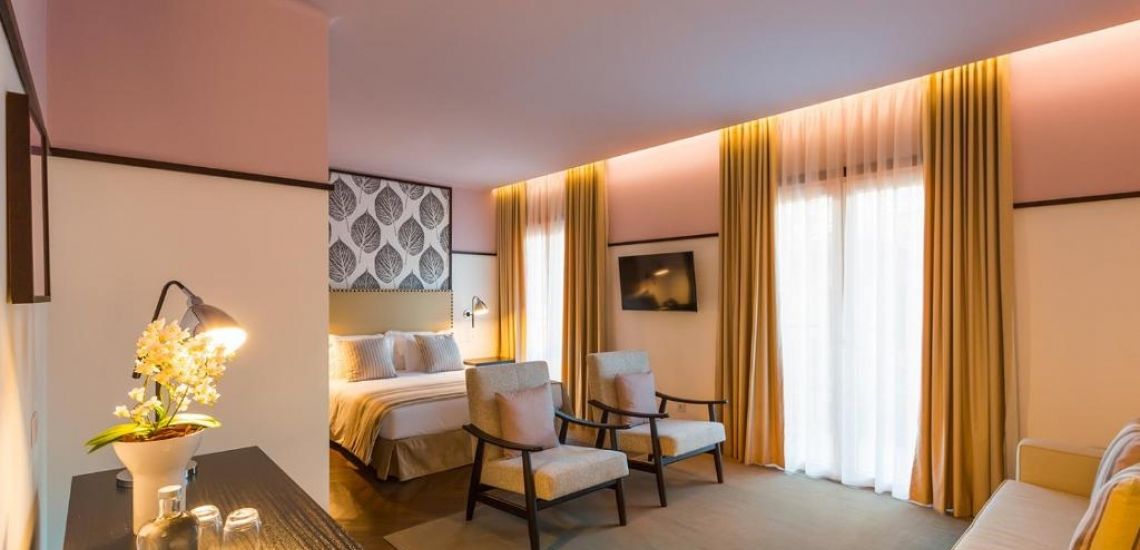 De luxe kamers van Castanheiro Boutique Hotel bieden veel ruimte