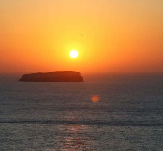 De mooiste zonsondergangen tijdens je Cycladen rondreis ga je missen, vandaag naar huis